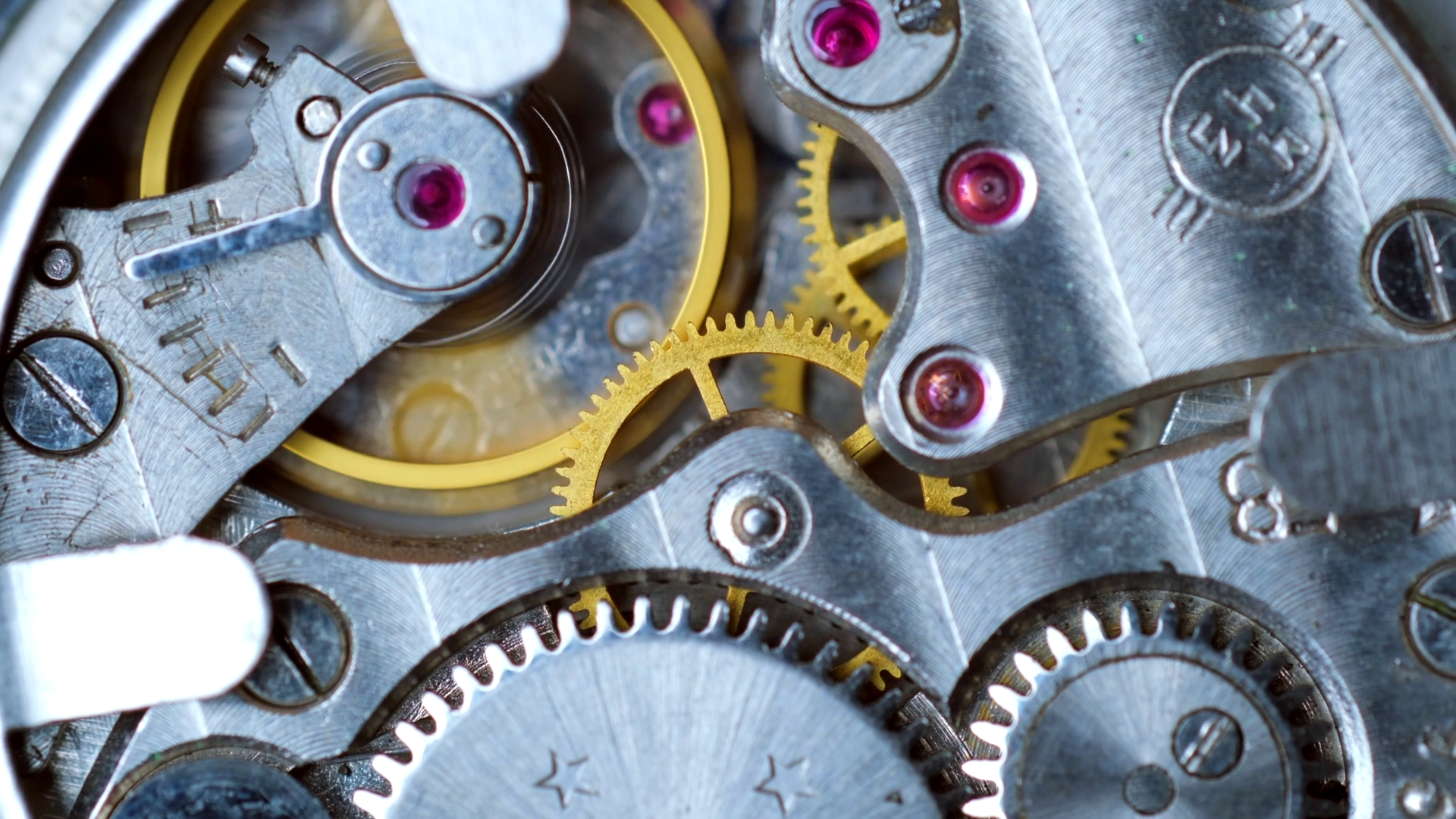 Close-up of meshing gear teeth from the supplied mechanisms clip.